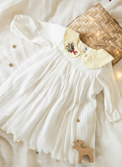 Flatlay of ivory textured baby dress with embroidered detachable collar – Rui.cares