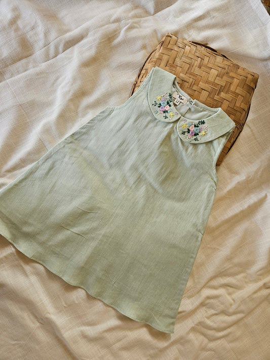 Sage green sleeveless baby dress with hand embroidered floral collar