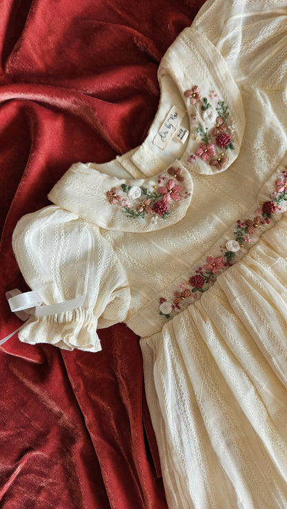 Close-up of Angel in Heaven dress sleeve with embroidered florals